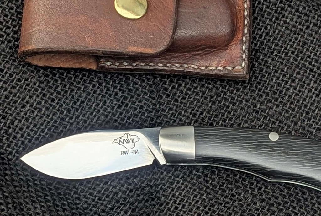 Handmade custom Slipjoint pocket knife in RWL34, croscut carbon fibre and 316 stainless steel