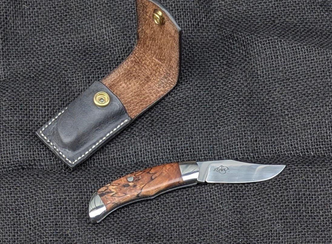 Clip-point slipjoint in Elmax, 316 and stabilised spalted beech