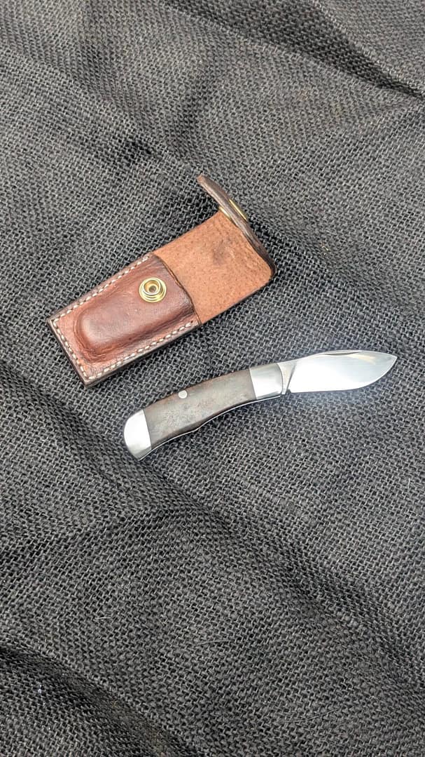 "Nessie" slipjoint in dark green vintage rag micarta, RWL34 and 316